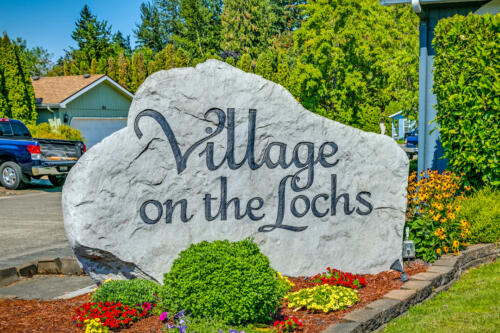 Village on the Lochs Sign